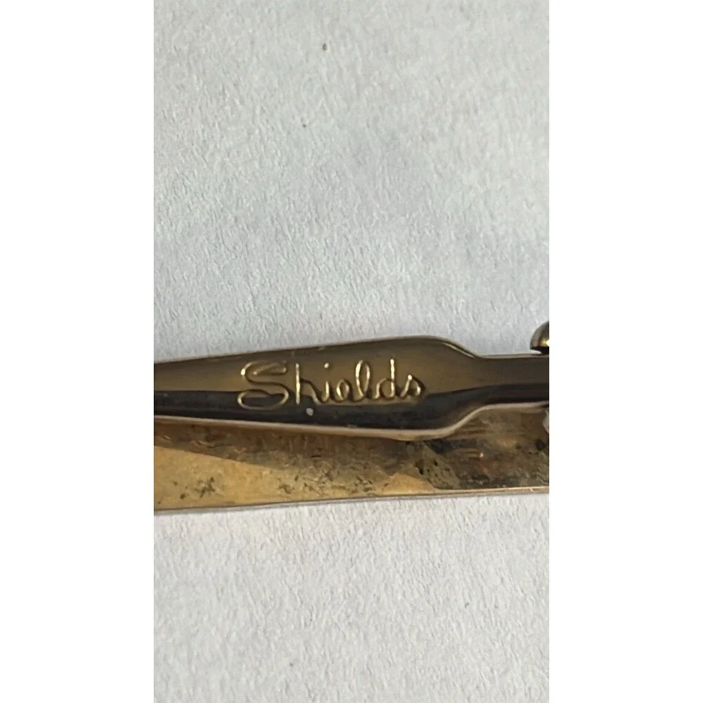 Vintage mid-century Shields cufflinks and matching tie clip set - gold tone